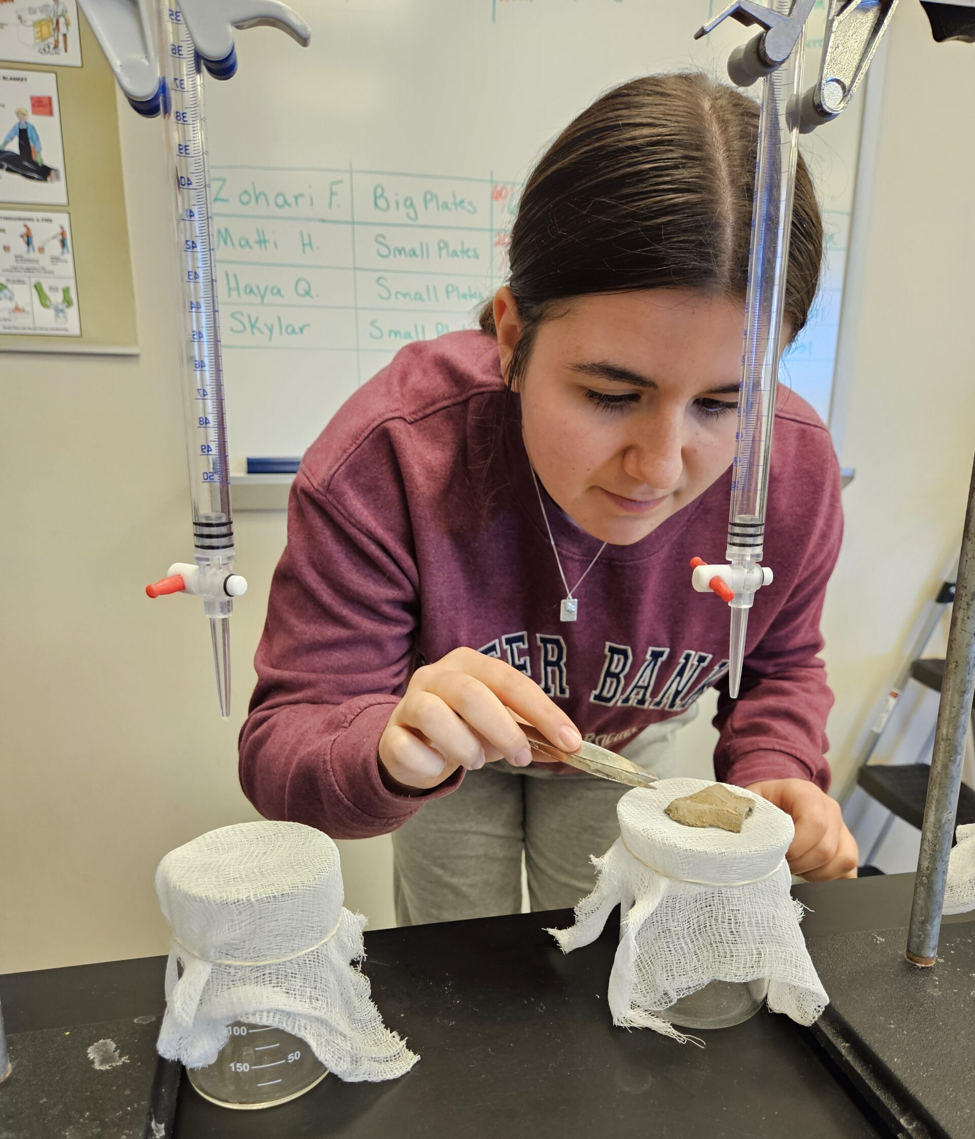 student tests rock in lab